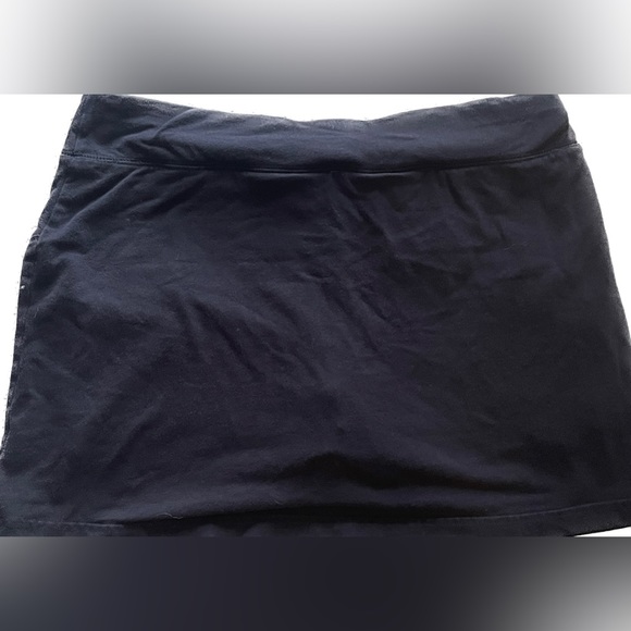 Athletic mini skirt, skort, shorts with cute button pocket and shorts built in - Picture 9 of 9